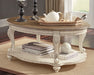 Realyn Coffee Table with 2 End Tables Homeline Furniture