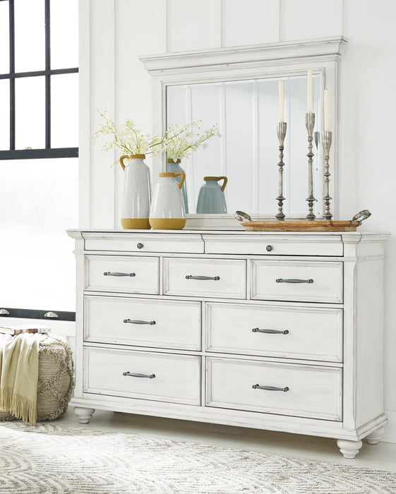 Kanwyn Queen Panel Bed with Storage with Mirrored Dresser