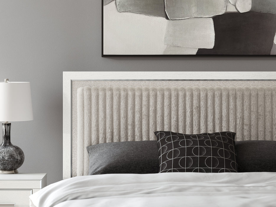 Zuraleus King Upholstered Panel Storage Bed