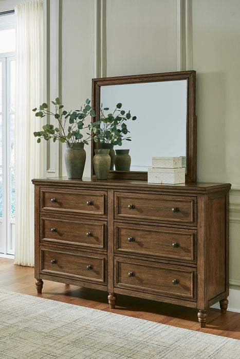 Sturlayne King Upholstered Panel Bed with Mirrored Dresser and Chest