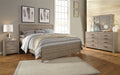 Culverbach King Panel Bed with Mirrored Dresser Homeline Furniture