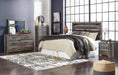 Drystan King Panel Headboard with Mirrored Dresser, Chest and Nightstand Homeline Furniture