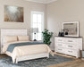 Gerridan Queen Panel Bed with Mirrored Dresser and Nightstand Homeline Furniture
