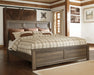 Juararo California King Panel Bed with Mirrored Dresser Homeline Furniture