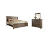 Juararo Queen Panel Bed with Mirrored Dresser Homeline Furniture