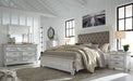 Kanwyn Queen Panel Bed with Mirrored Dresser and Chest Homeline Furniture