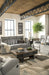 Mitchiner REC Sofa w/Drop Down Table Homeline Furniture